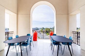 Sky deck with soft seating, televisions and bar - perfect for entertaining
